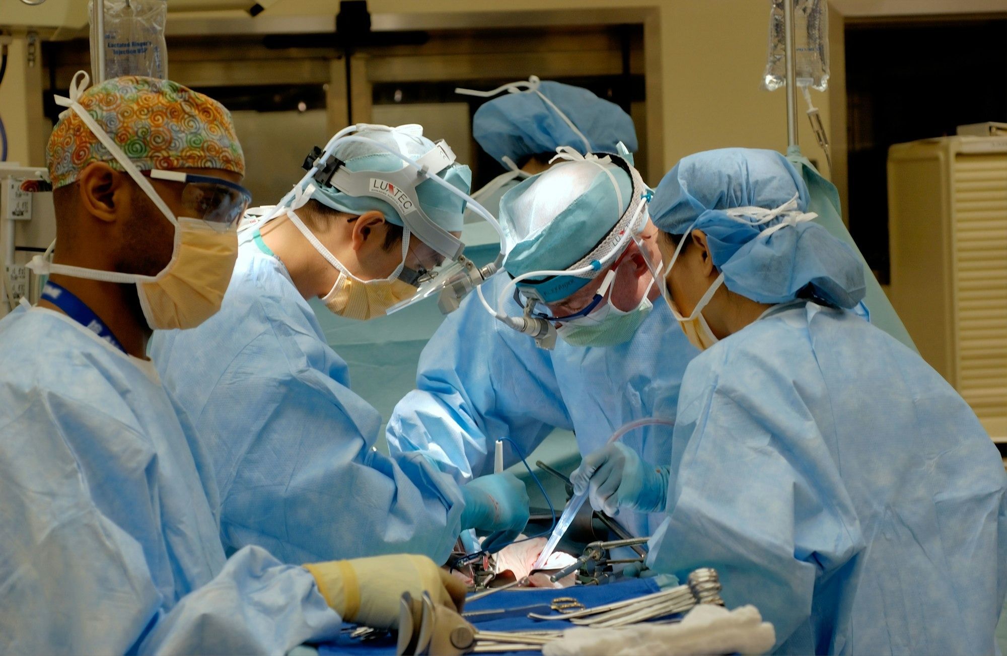 A surgical team working as one around a procedure